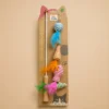 4-in-1 cat feather wand toy on packaging with wooden handle and bell