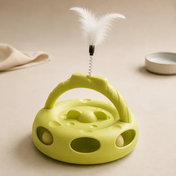 Green Interactive Rolling Ball Cat Toy with dangling feather attachment