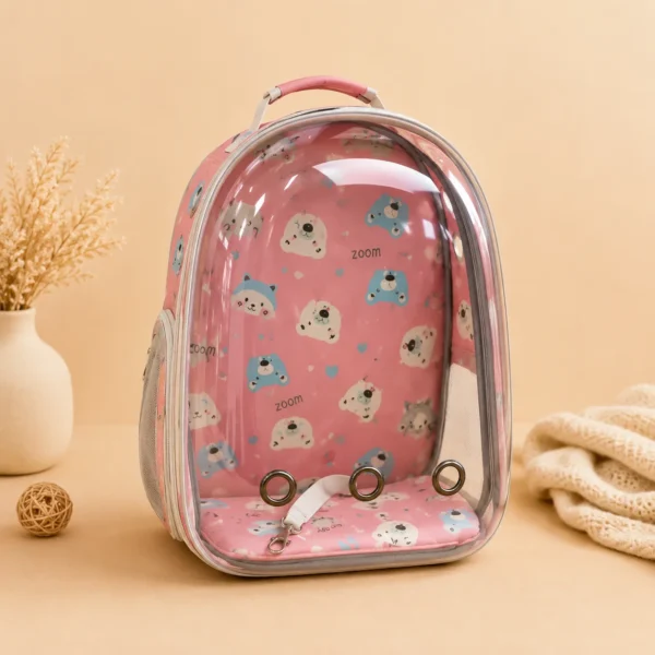 Transparent bubble window cat carrier backpack with pink bear-print interior and ventilation holes